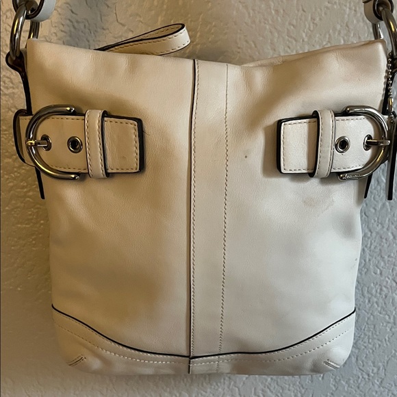 Vintage Coach White Leather Shoulder Bag
With Silver Tone Buckles And Rings - Picture 2 of 12